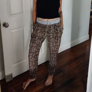 Snake skin patterned silky pants with pockets